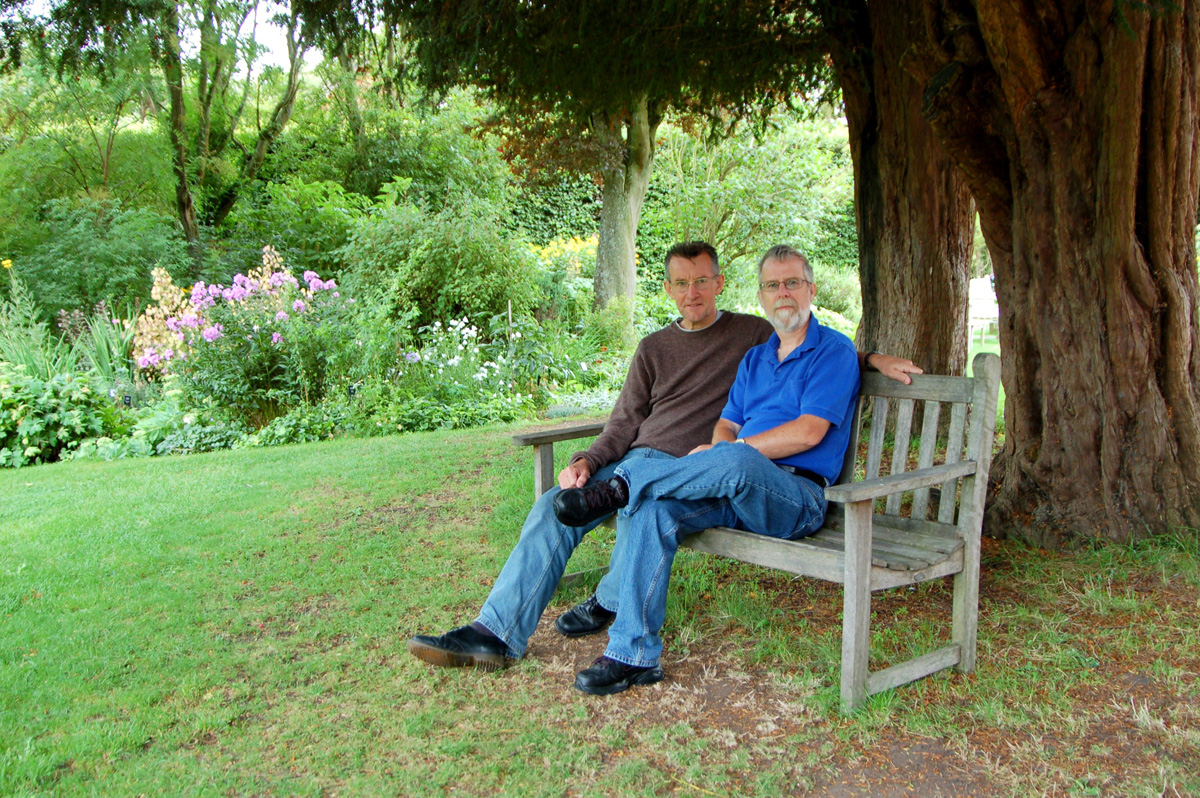 Tony (l) and his friend Clive sit under the fir tree. Image@Tony Grant